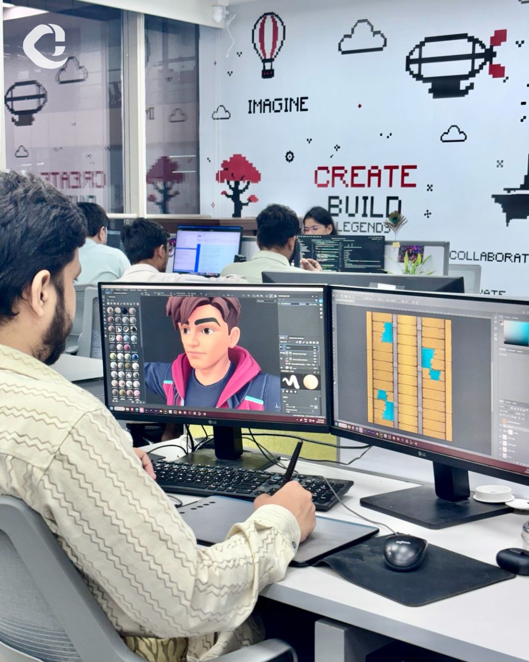 A real Capermint game artist working on character and environment artwork in the Ahmedabad studio